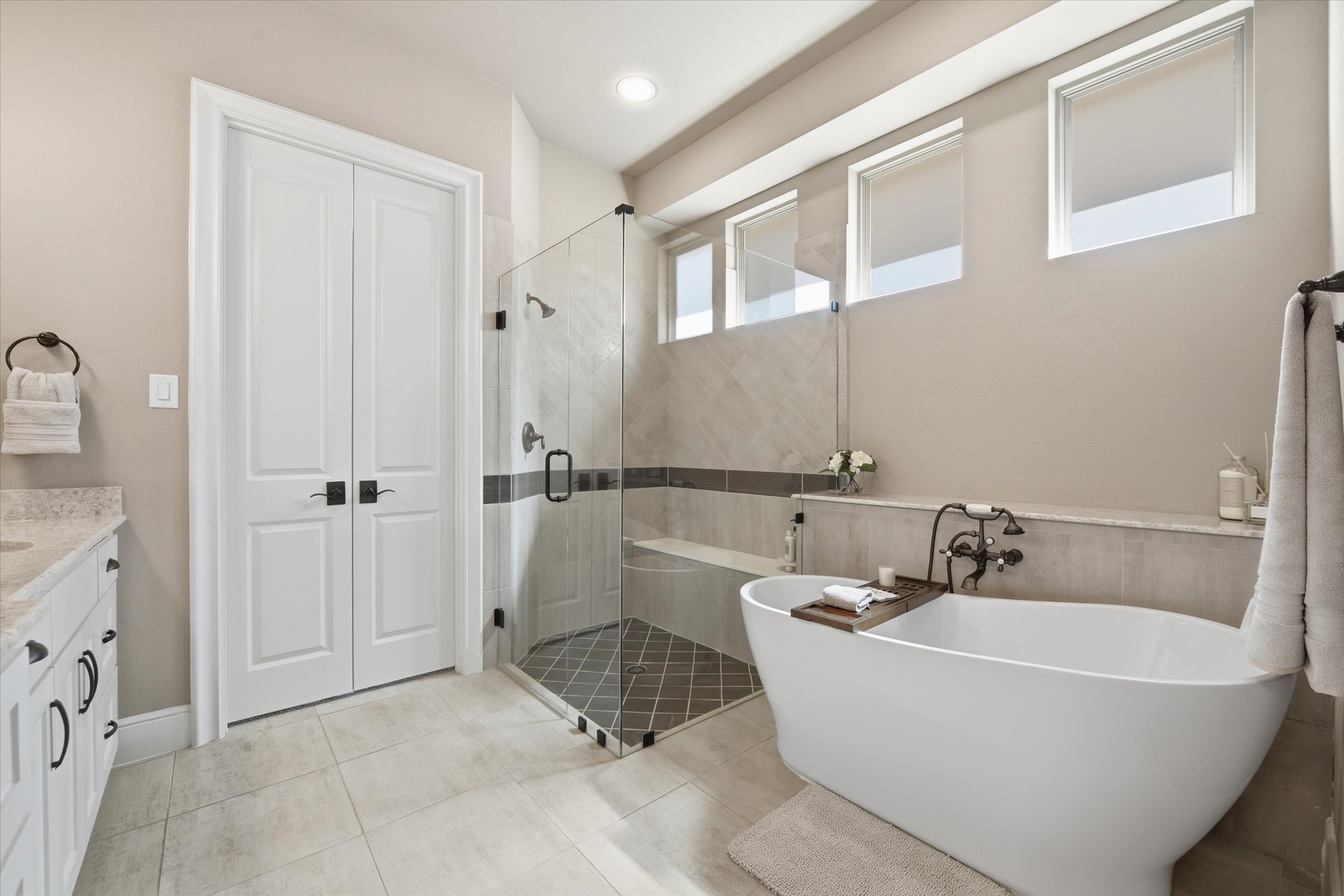 Primary bathroom with soaking tub and walk-in shower